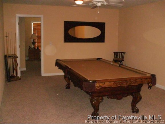 211 Booth Pond Road Raeford, NC 28376 - Photo 14 of 25 a room with a table and chairs