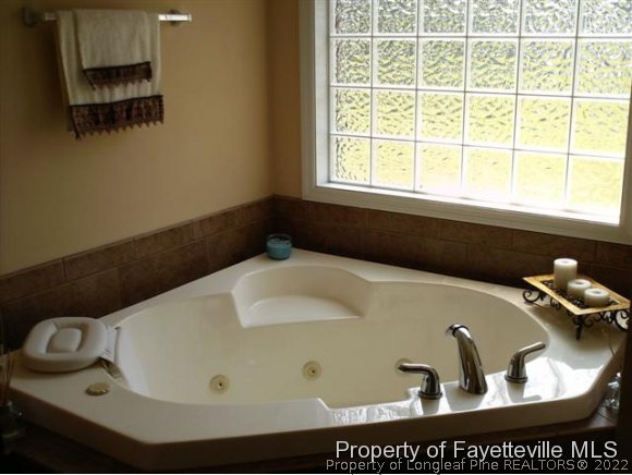 211 Booth Pond Road Raeford, NC 28376 - Photo 18 of 25 a bathroom with a sink