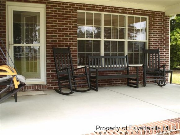211 Booth Pond Road Raeford, NC 28376 - Photo 24 of 25 a view of outdoor space with barbeque