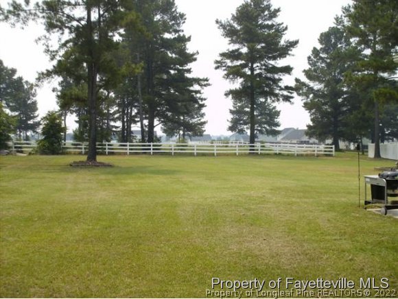 211 Booth Pond Road Raeford, NC 28376 - Photo 25 of 25 a view of a swimming pool and outdoor space