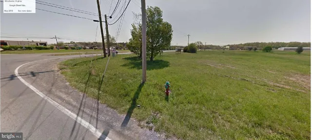 a view of a lake with a big yard