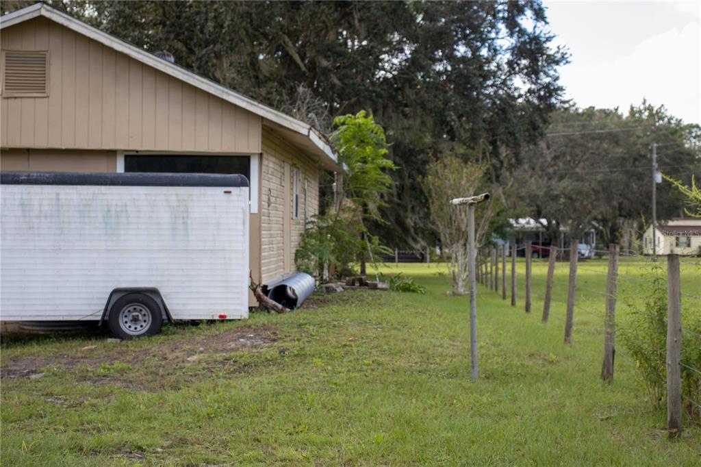 6130 Fussell Road Polk City, FL 33868 - Photo 14 of 21 a view of a back yard of the house