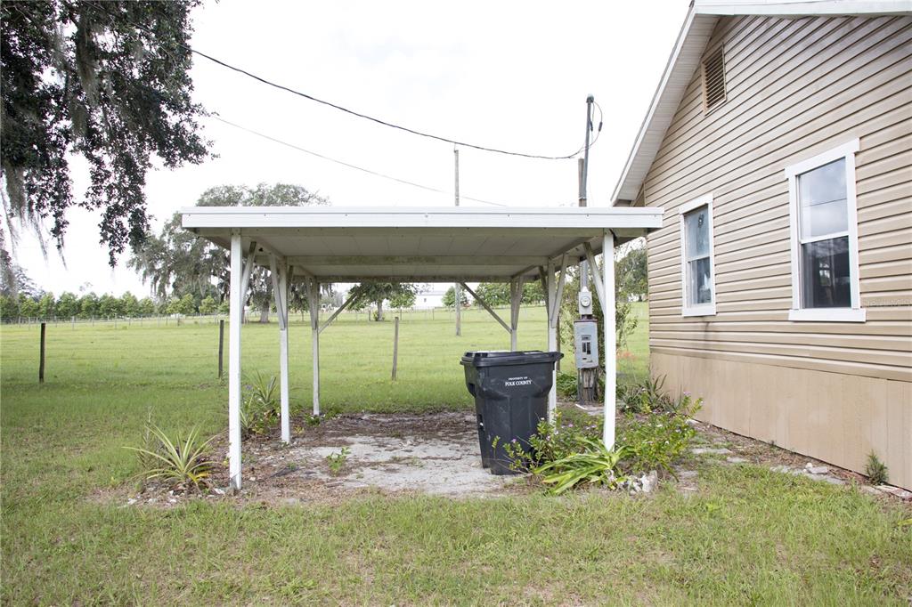 6130 Fussell Road Polk City, FL 33868 - Photo 16 of 21 a view of outdoor space yard and patio