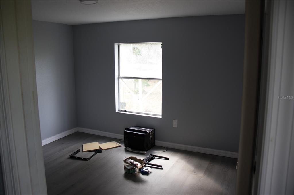 6130 Fussell Road Polk City, FL 33868 - Photo 5 of 21 a view of a workspace with a window