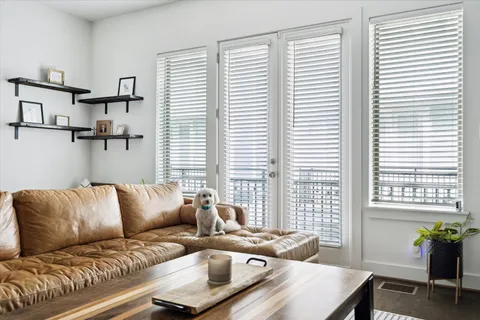 a living room with furniture and a window