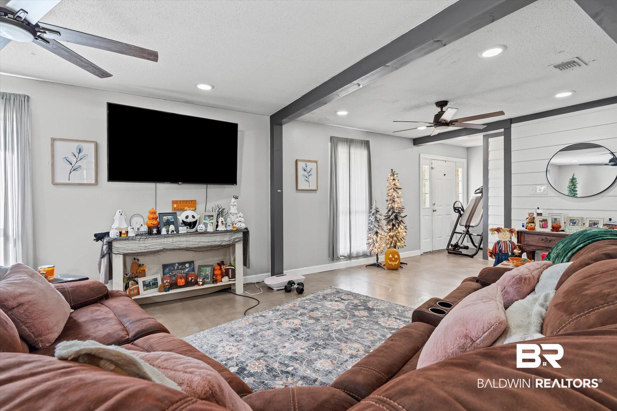 11440 Diffee Road Grand Bay, AL 36541 - Photo 5 of 22 Living room featuring ceiling fan, recessed lighting, concrete flooring, and a textured ceiling