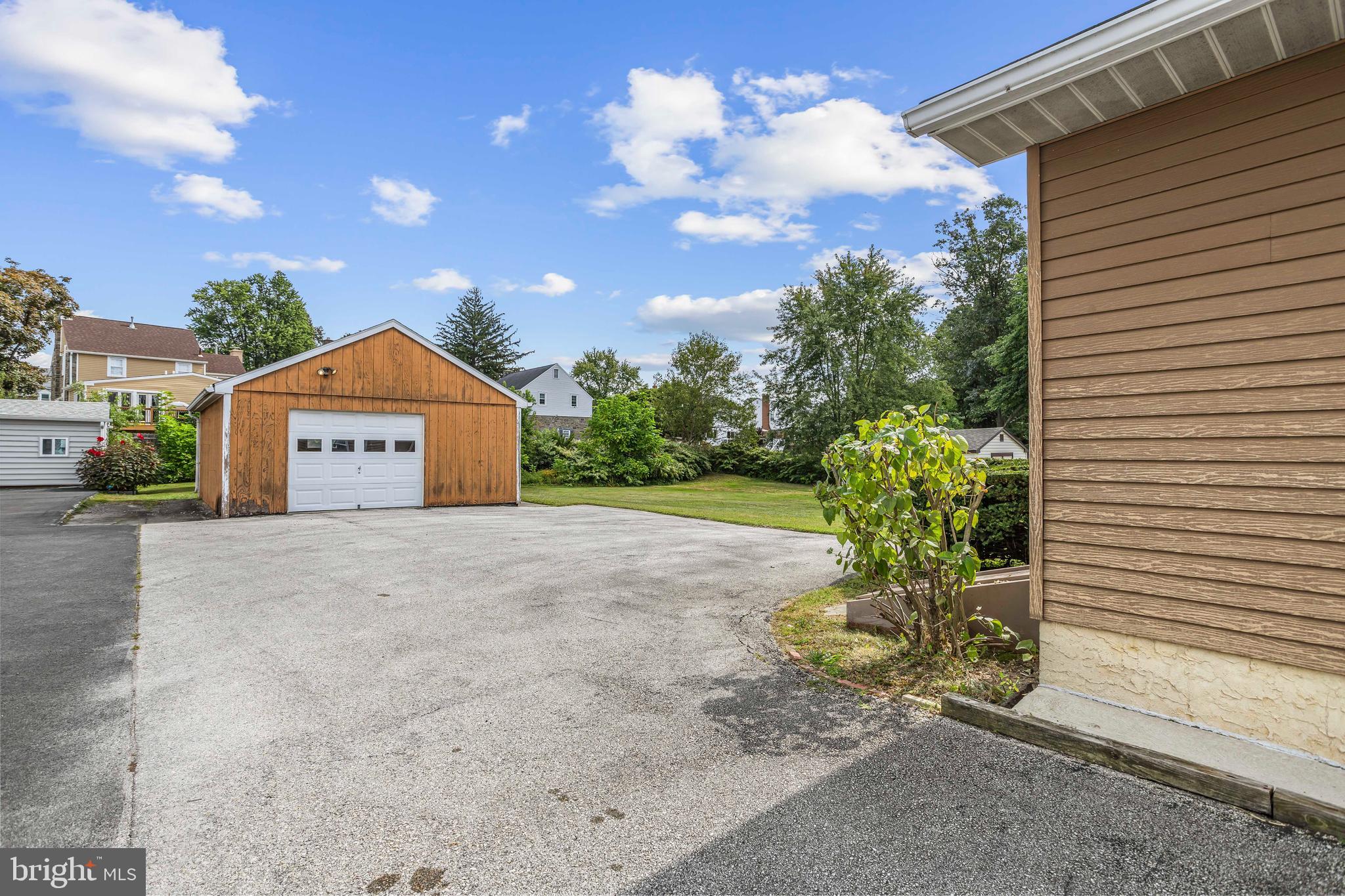 253 Saxer Avenue Springfield, PA 19064 - Photo 23 of 25 a house view with a garden space