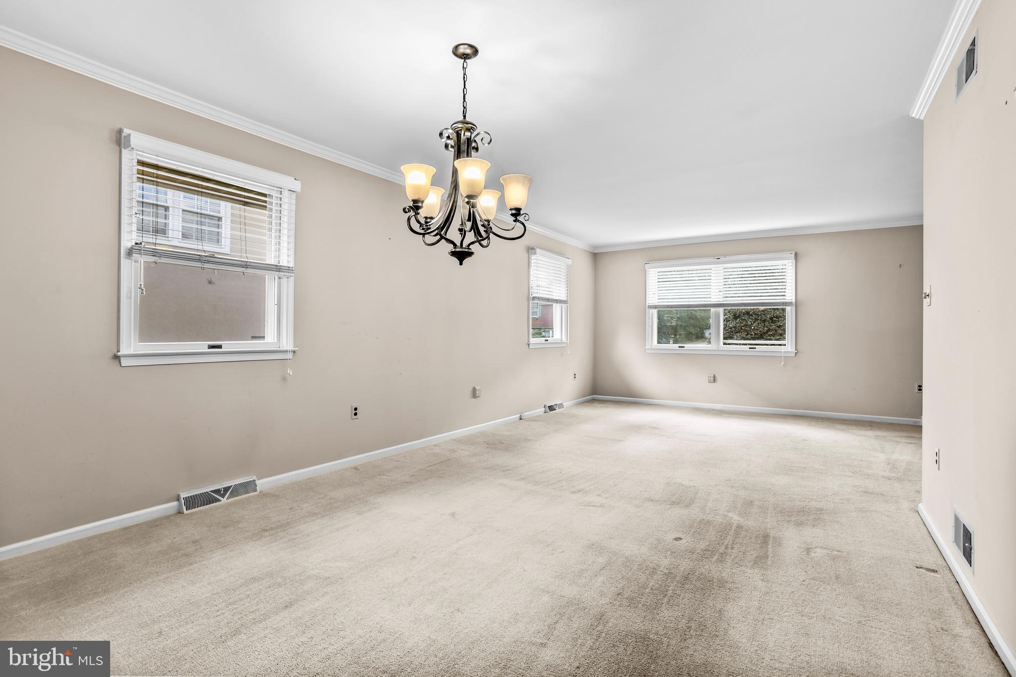 253 Saxer Avenue Springfield, PA 19064 - Photo 8 of 25 a view of an empty room with a window