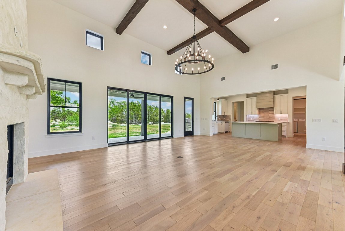 116 Tranquility Trail Spicewood, TX 78669 - Photo 12 of 40 a view of an empty room with a window