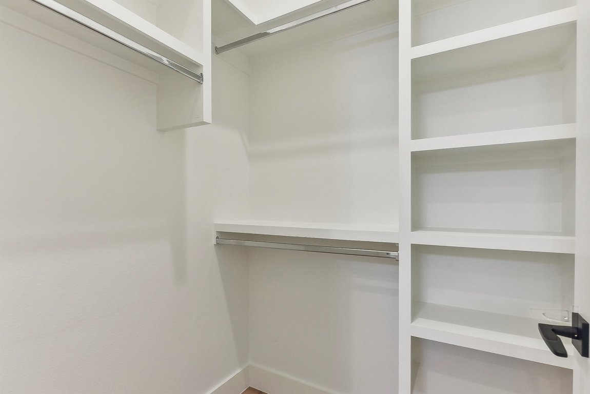 116 Tranquility Trail Spicewood, TX 78669 - Photo 26 of 40 a view of an empty walk in closet