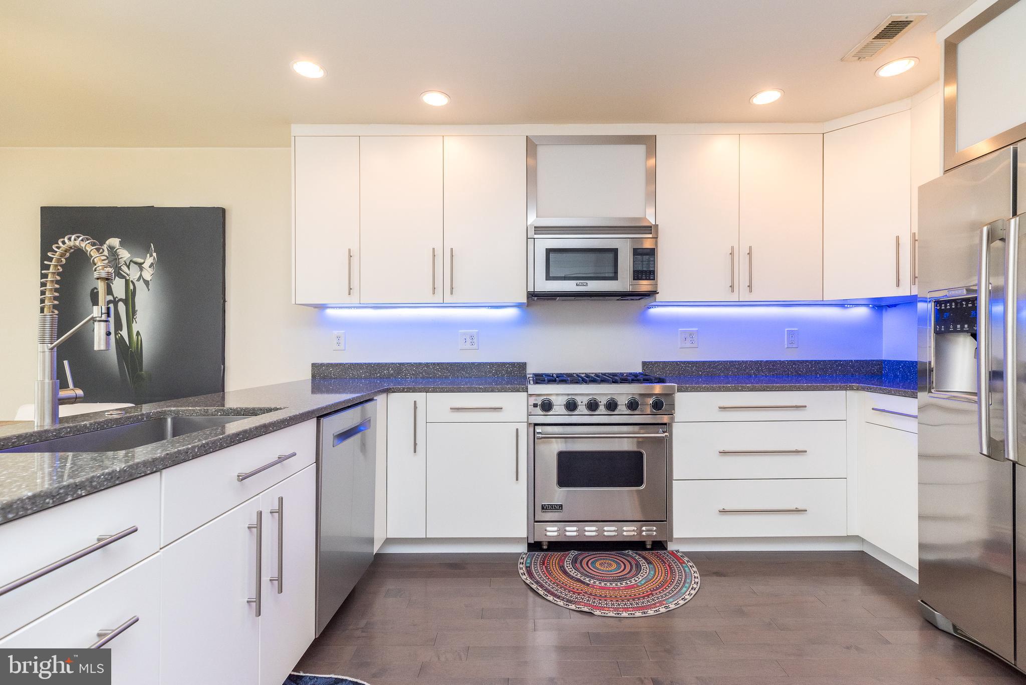 5087 Beacon Hill Court Doylestown, PA 18902 - Photo 11 of 28 a kitchen with granite countertop cabinets stainless steel appliances and a counter space