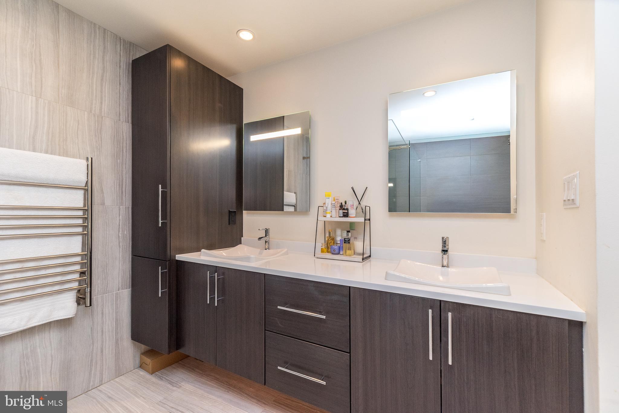 5087 Beacon Hill Court Doylestown, PA 18902 - Photo 17 of 28 a bathroom with a double vanity sink and mirror