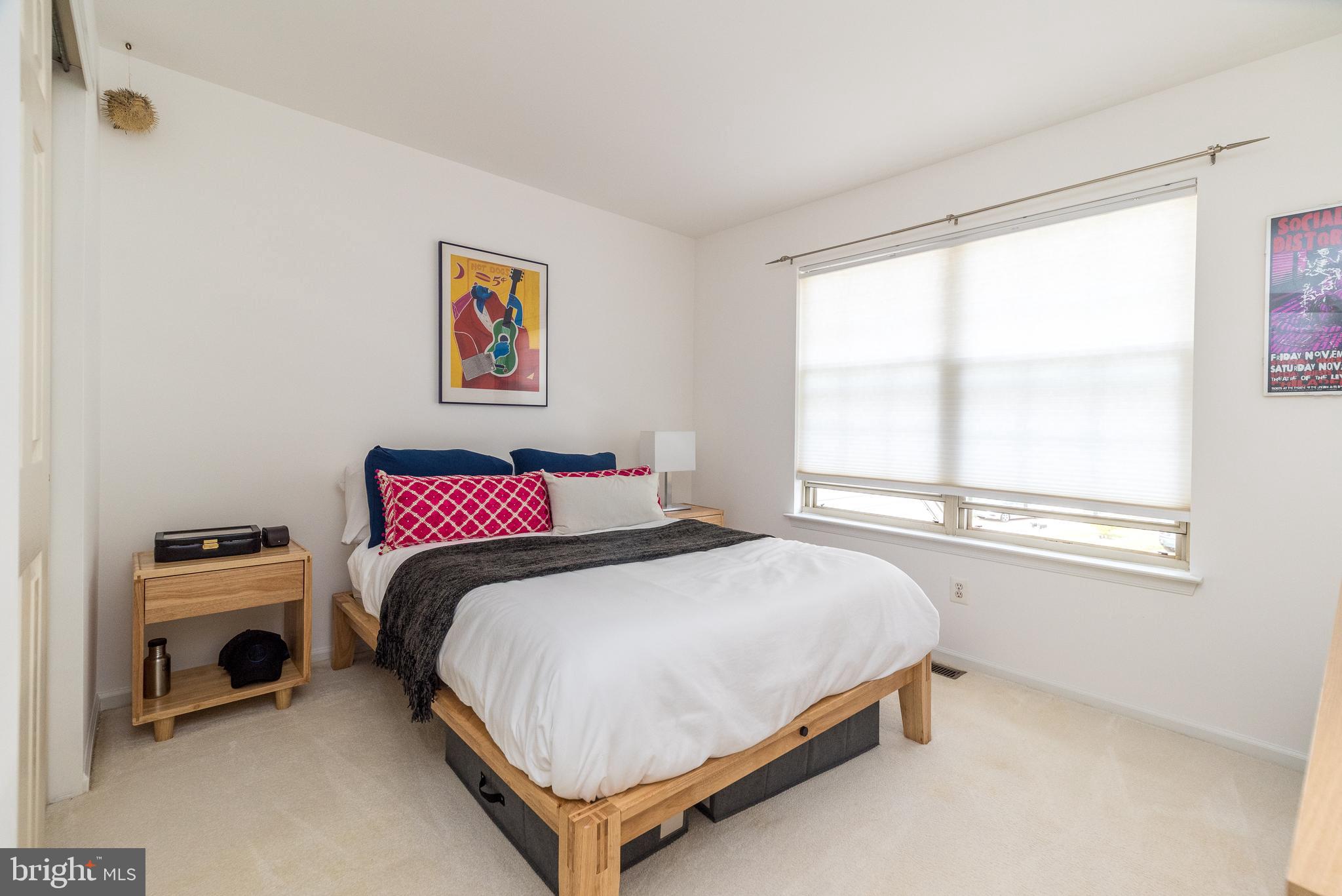 5087 Beacon Hill Court Doylestown, PA 18902 - Photo 20 of 28 a bedroom with a bed and a window