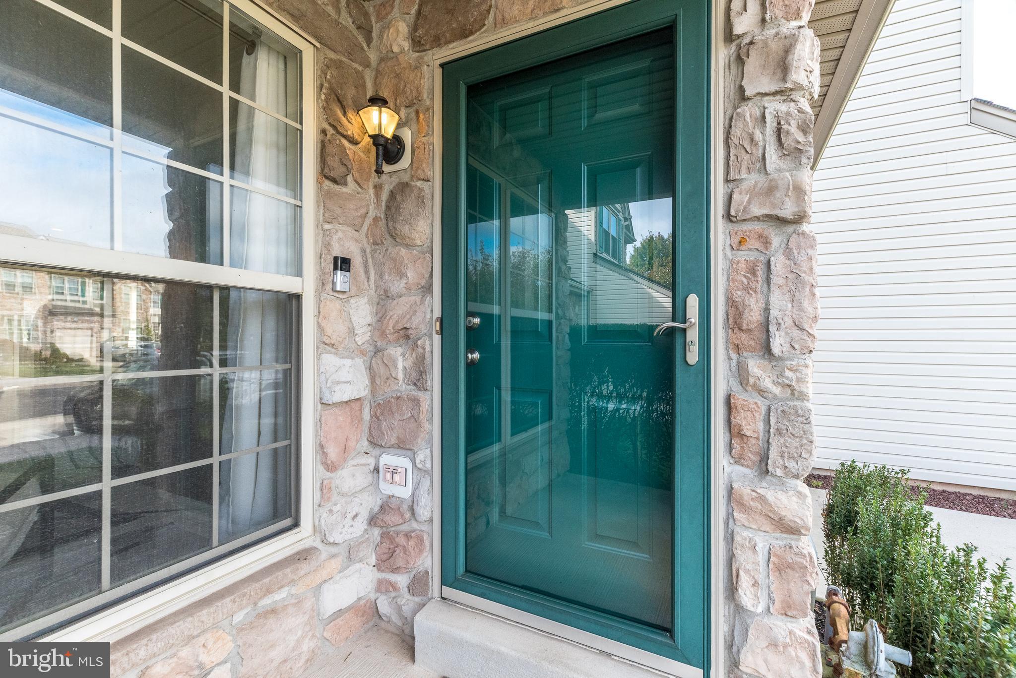 5087 Beacon Hill Court Doylestown, PA 18902 - Photo 2 of 28 a view of a glass door of the house