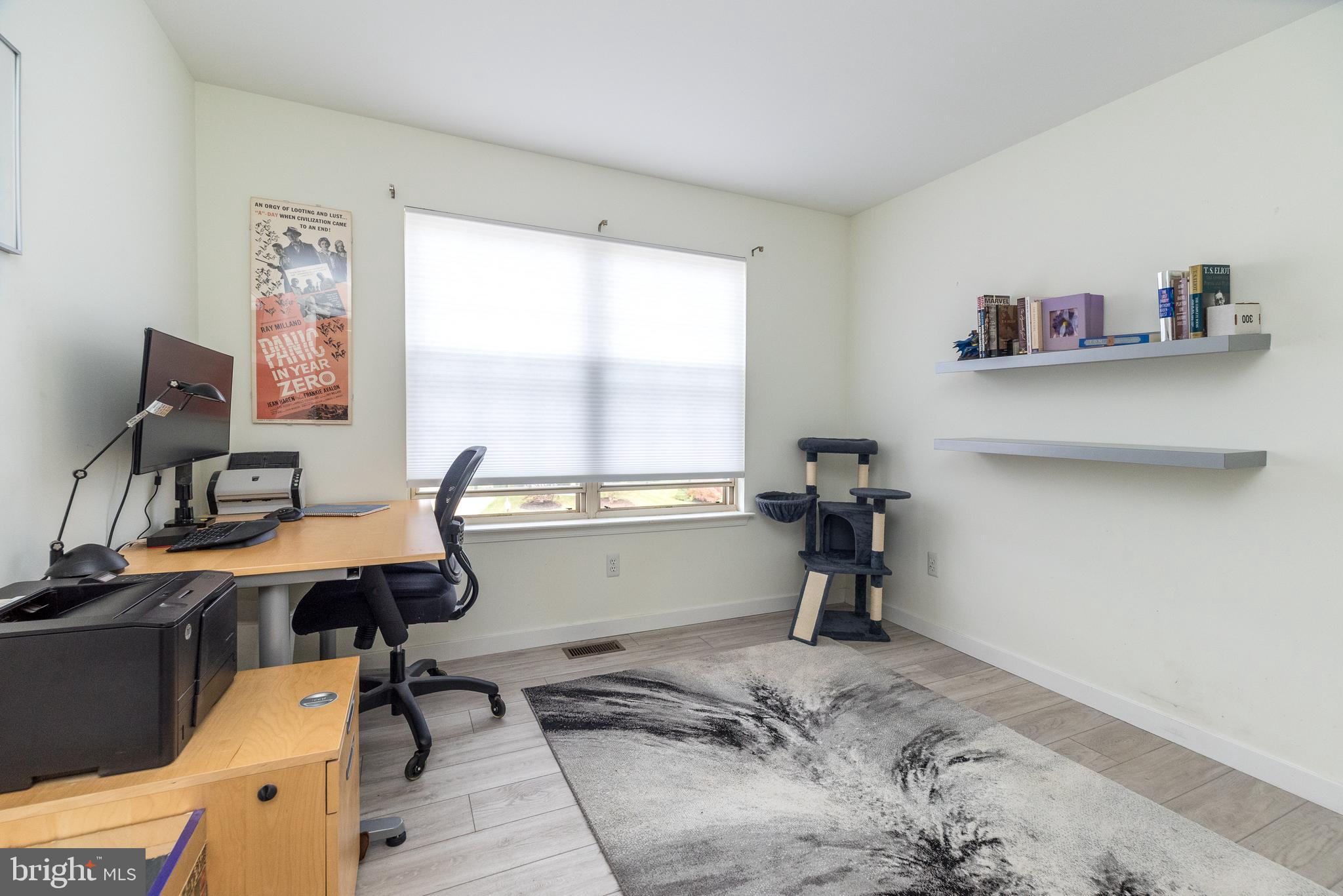 5087 Beacon Hill Court Doylestown, PA 18902 - Photo 21 of 28 a view of a workspace with furniture and a window