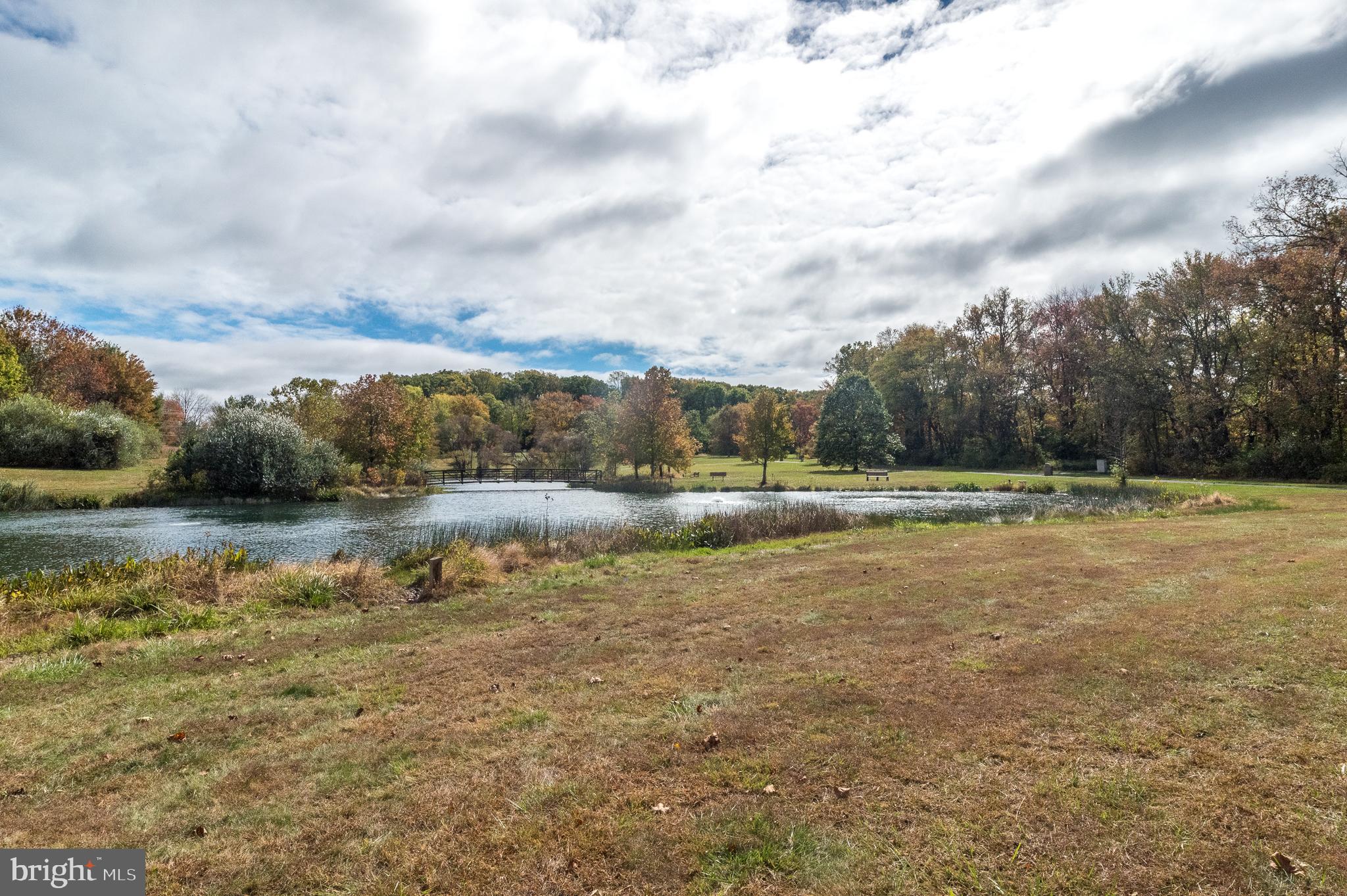 5087 Beacon Hill Court Doylestown, PA 18902 - Photo 27 of 28 a view of a lake with houses in the back