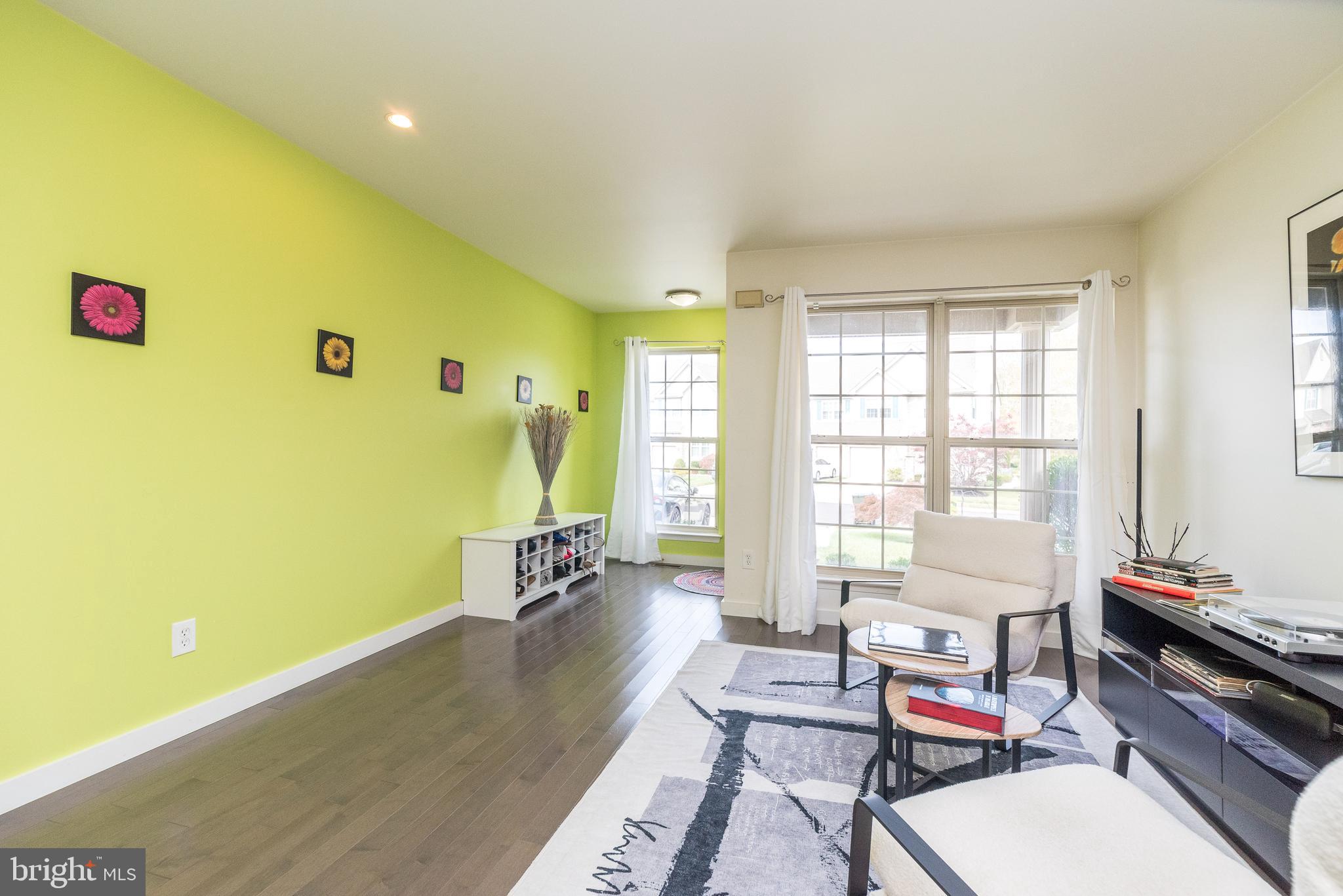 5087 Beacon Hill Court Doylestown, PA 18902 - Photo 4 of 28 a living room with furniture and a window