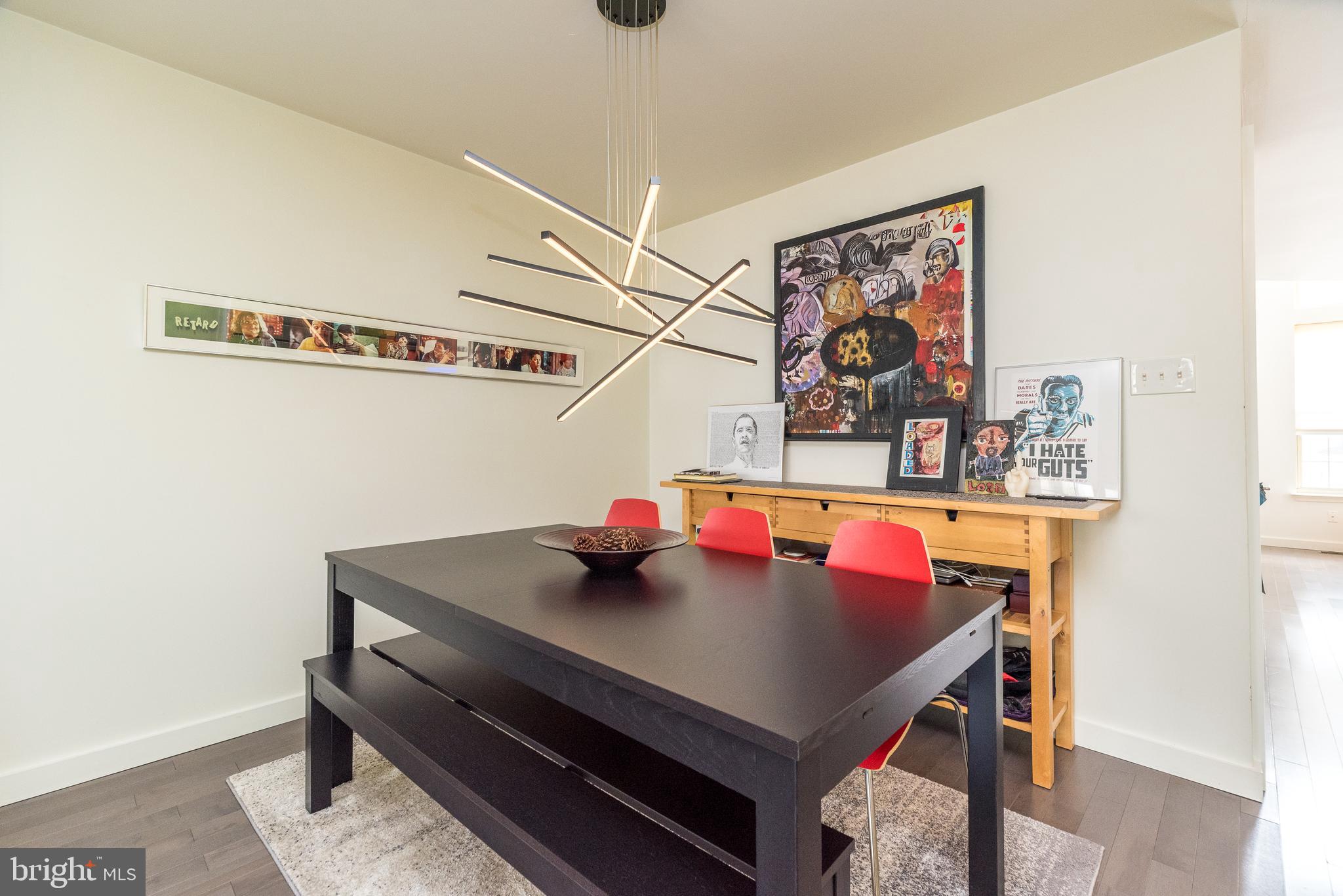 5087 Beacon Hill Court Doylestown, PA 18902 - Photo 6 of 28 a view of table and chairs in the room