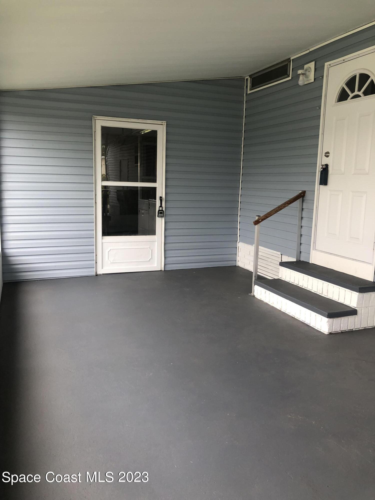 522 Egret Circle Sebastian, FL 32976 - Photo 2 of 14 a view of an empty room with a window