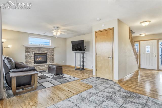 8820 Theriot Road Peyton, CO 80831 - Photo 50 of 50 Main Level open floor plan with welcoming gas fire place!