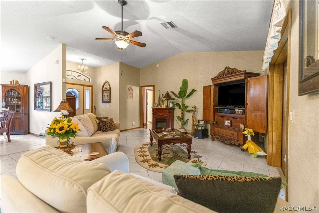 2964 South Cygnet Terrace Inverness, FL 34450 - Photo 5 of 67 a living room with furniture and a flat screen tv