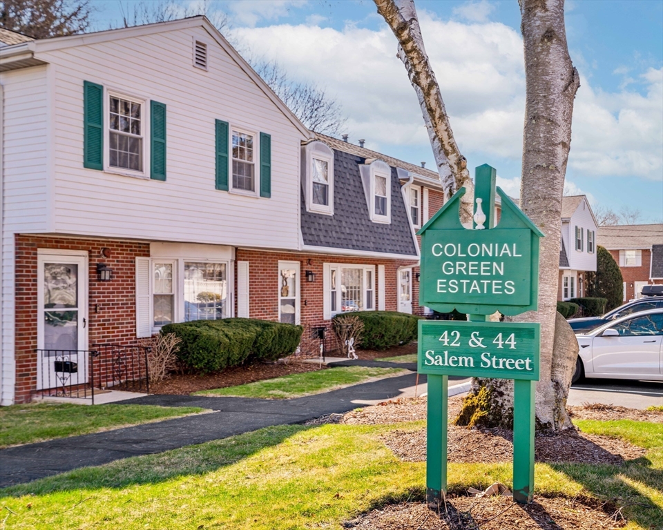 a front view of a building with street view
