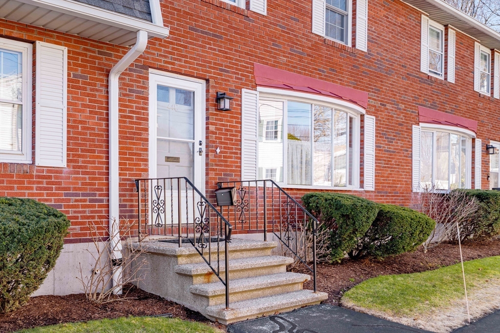44 Salem Street, Unit C Wakefield, MA 01880 - Photo 26 of 26 front view of a house with a yard