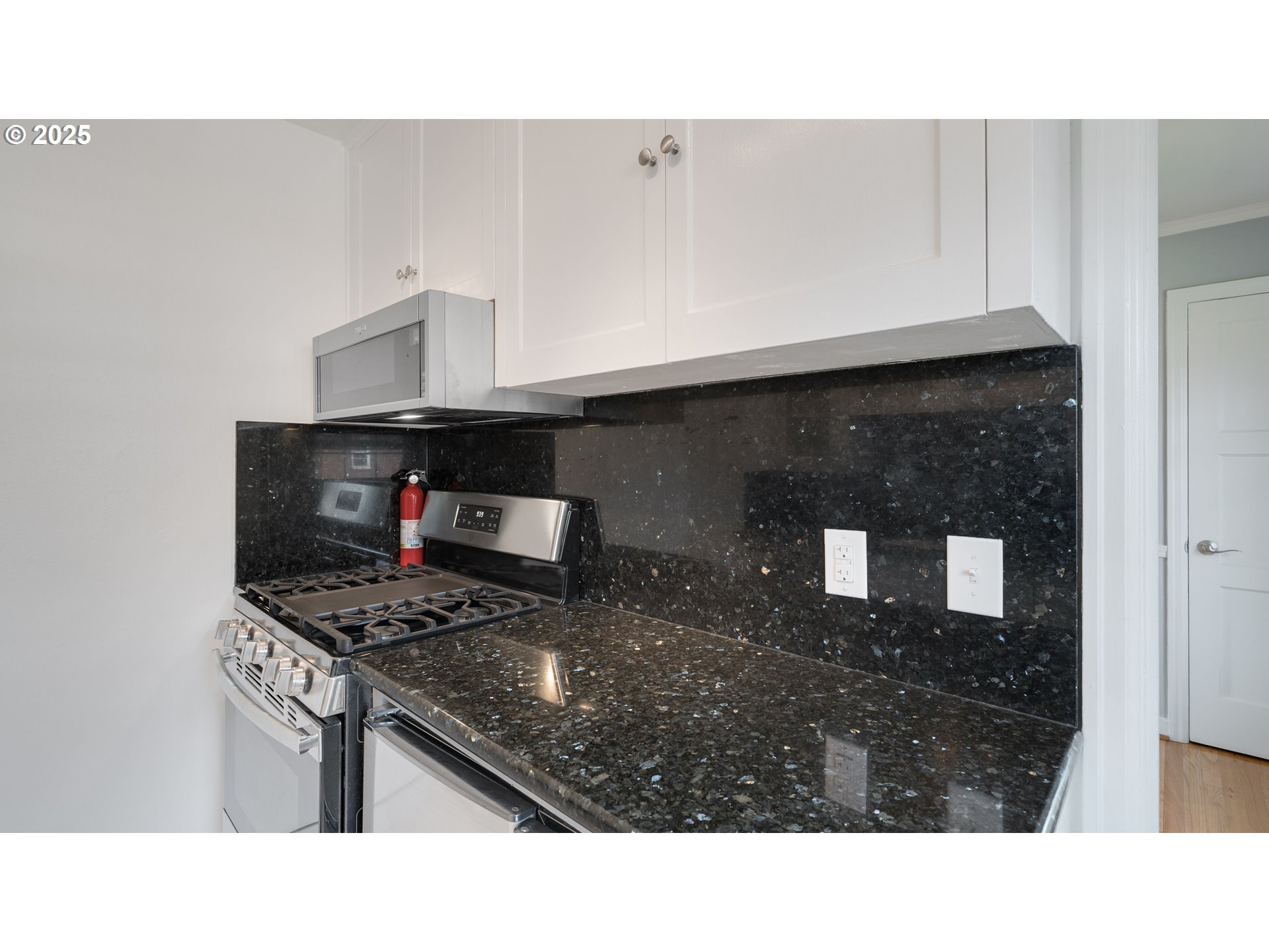 308 East 12th Street, Unit 308B Vancouver, WA 98660 - Photo 13 of 28 a black and white photo of a sink