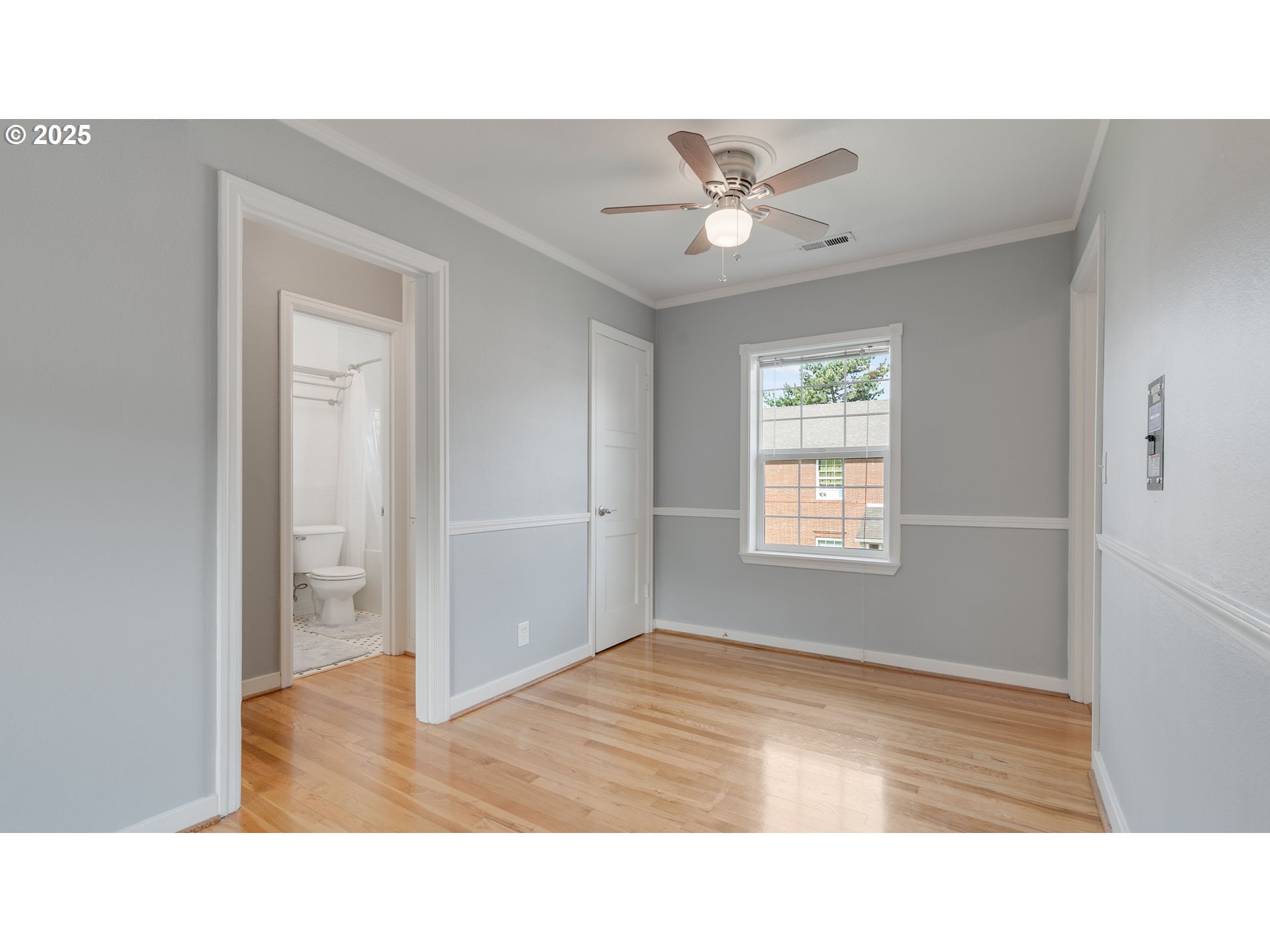 308 East 12th Street, Unit 308B Vancouver, WA 98660 - Photo 15 of 28 a open living room with a ceiling fan