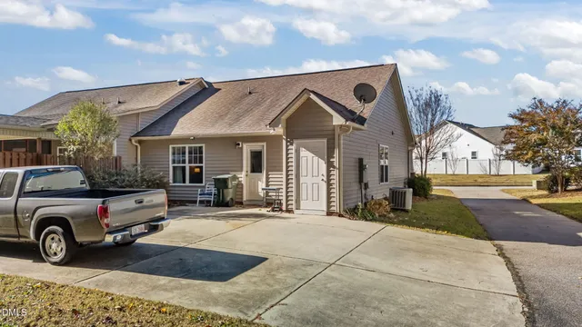a view of a car in front of house