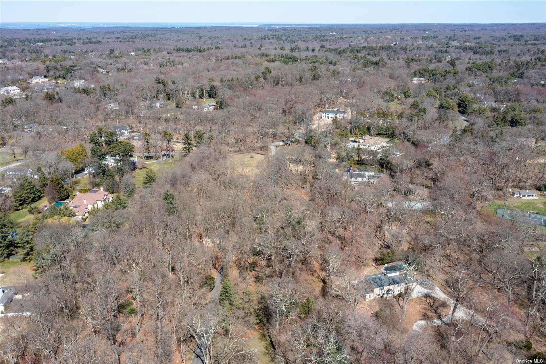 1622 Old Cedar Swamp Road Glen Head, NY 11545 - Photo 6 of 10 a view of a dry field