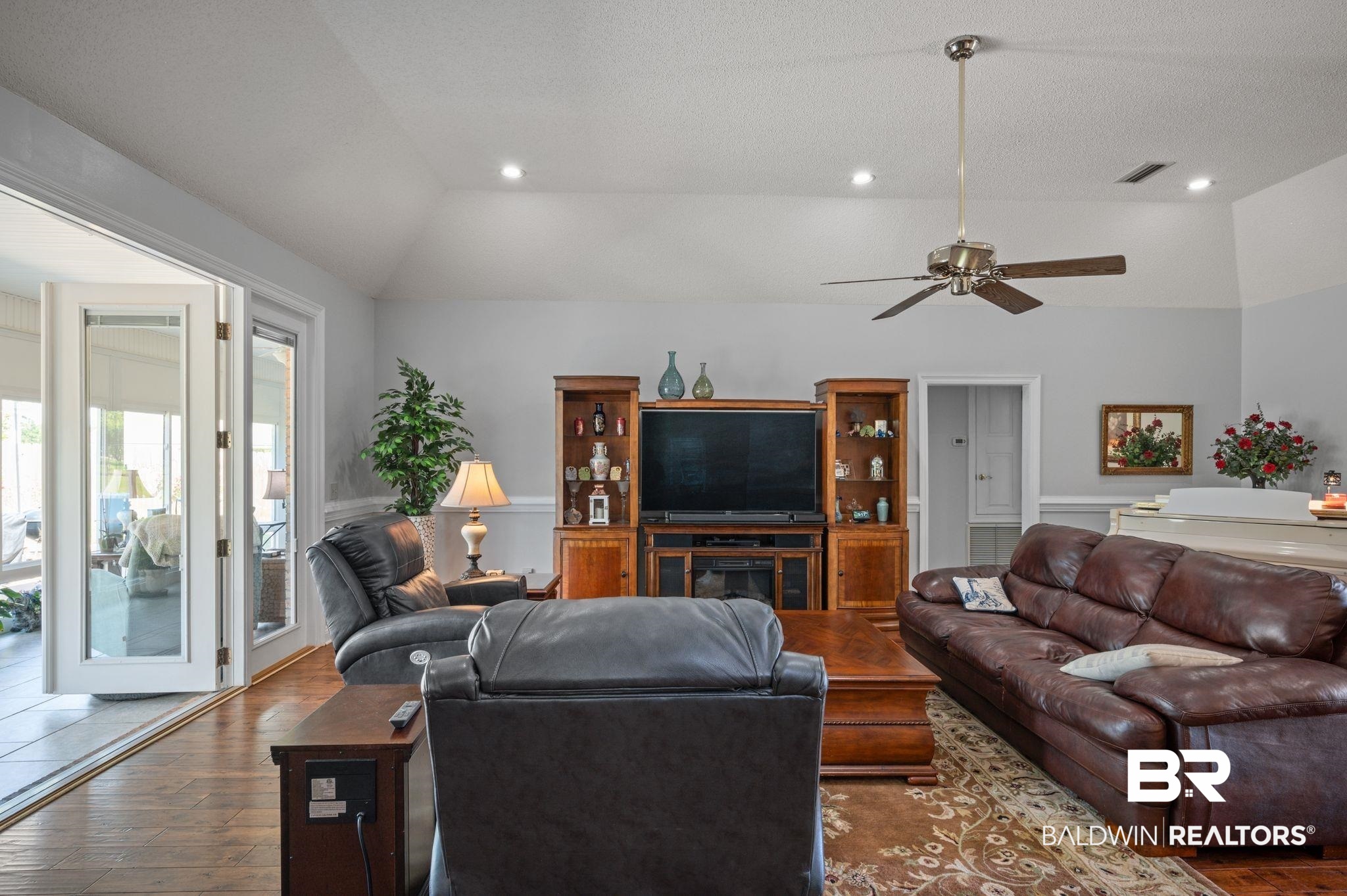 3100 Radcliff Road Saraland, AL 36571 - Photo 6 of 65 Living area with visible vents, ceiling fan, recessed lighting, wood-type flooring, and lofted ceiling