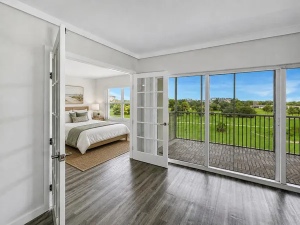 a bedroom with a bed and a view of bedroom