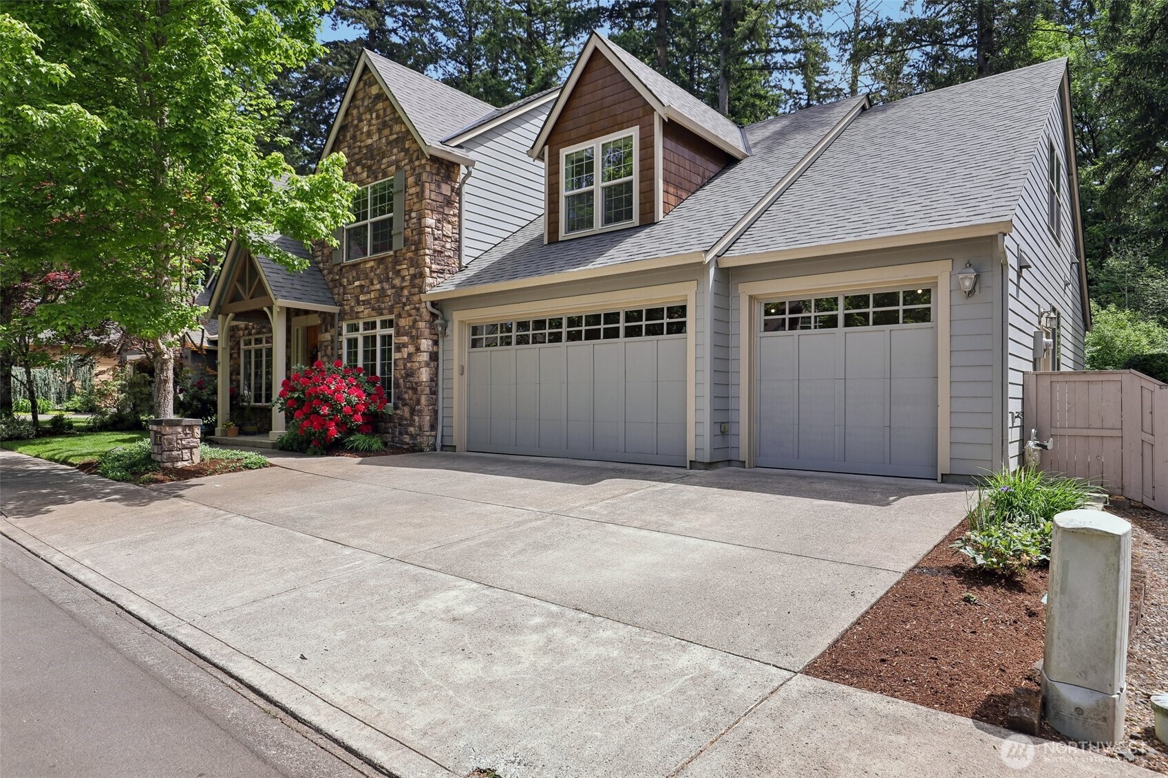 19709 Southeast 26th Way Camas, WA 98607 - Photo 36 of 36 a front view of a house with a yard and garage
