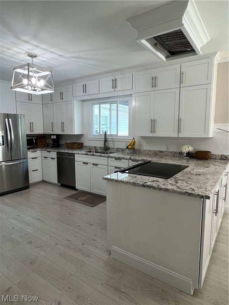 3130 Lake Road West Ashtabula, OH 44004 - Photo 2 of 35 Kitchen 25 x 12 with white cabinets, granite counters.