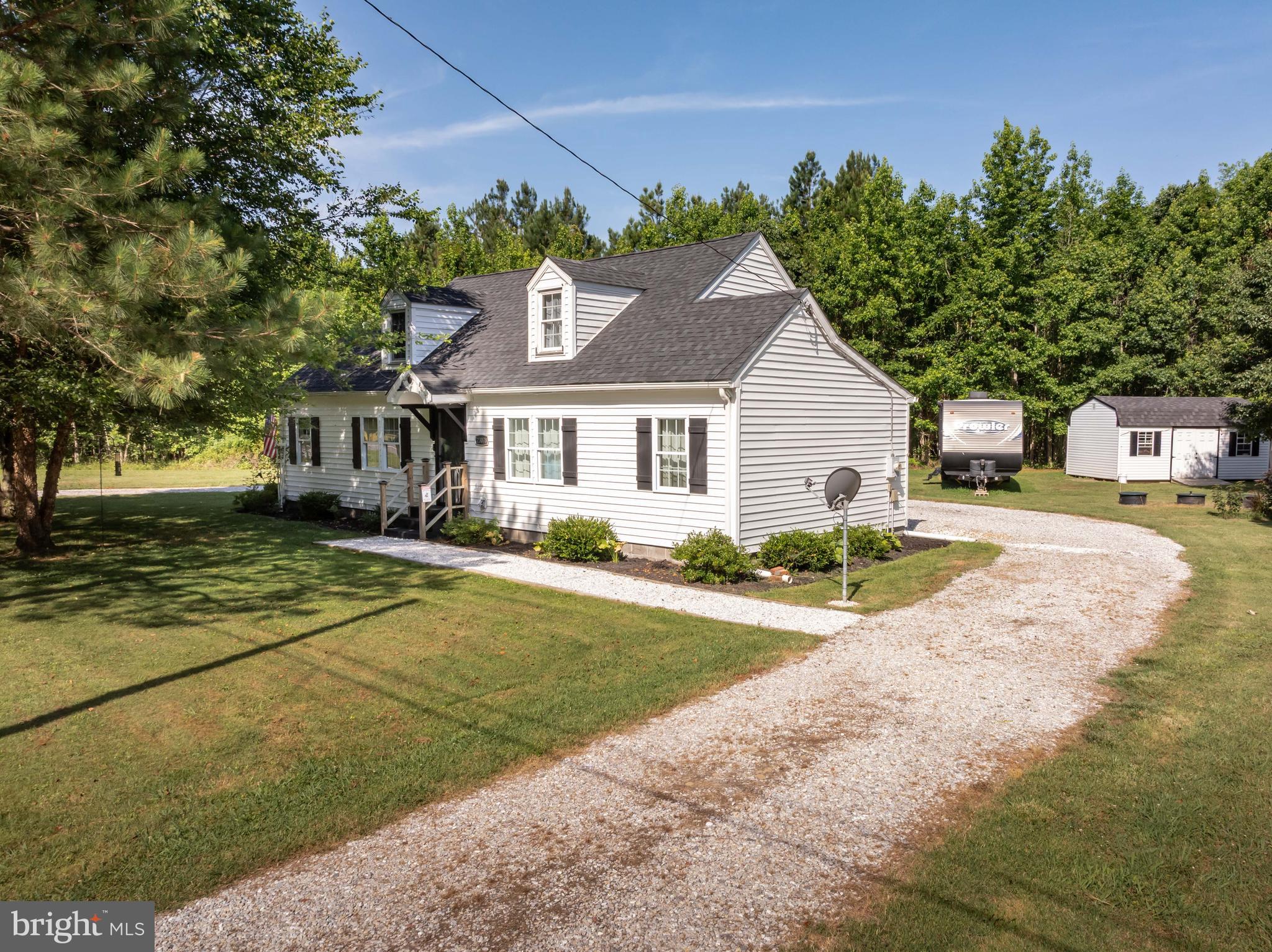 23078 Nanticoke Road Quantico, MD 21856 - Photo 47 of 67 a front view of a house with a yard