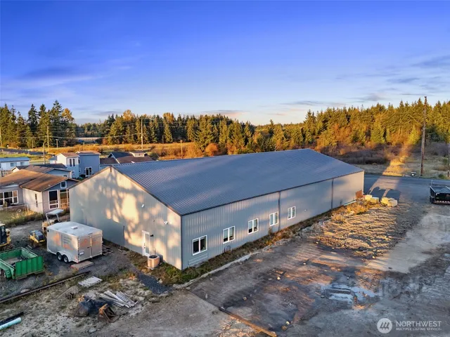 a aerial view of a house with a yard