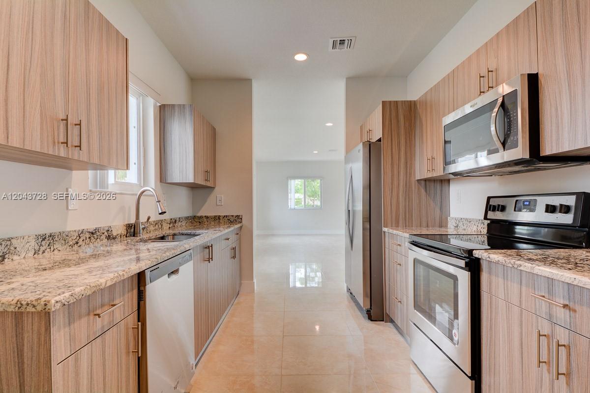 312 Phippen Waiters Road Dania Beach, FL 33004 - Photo 3 of 15