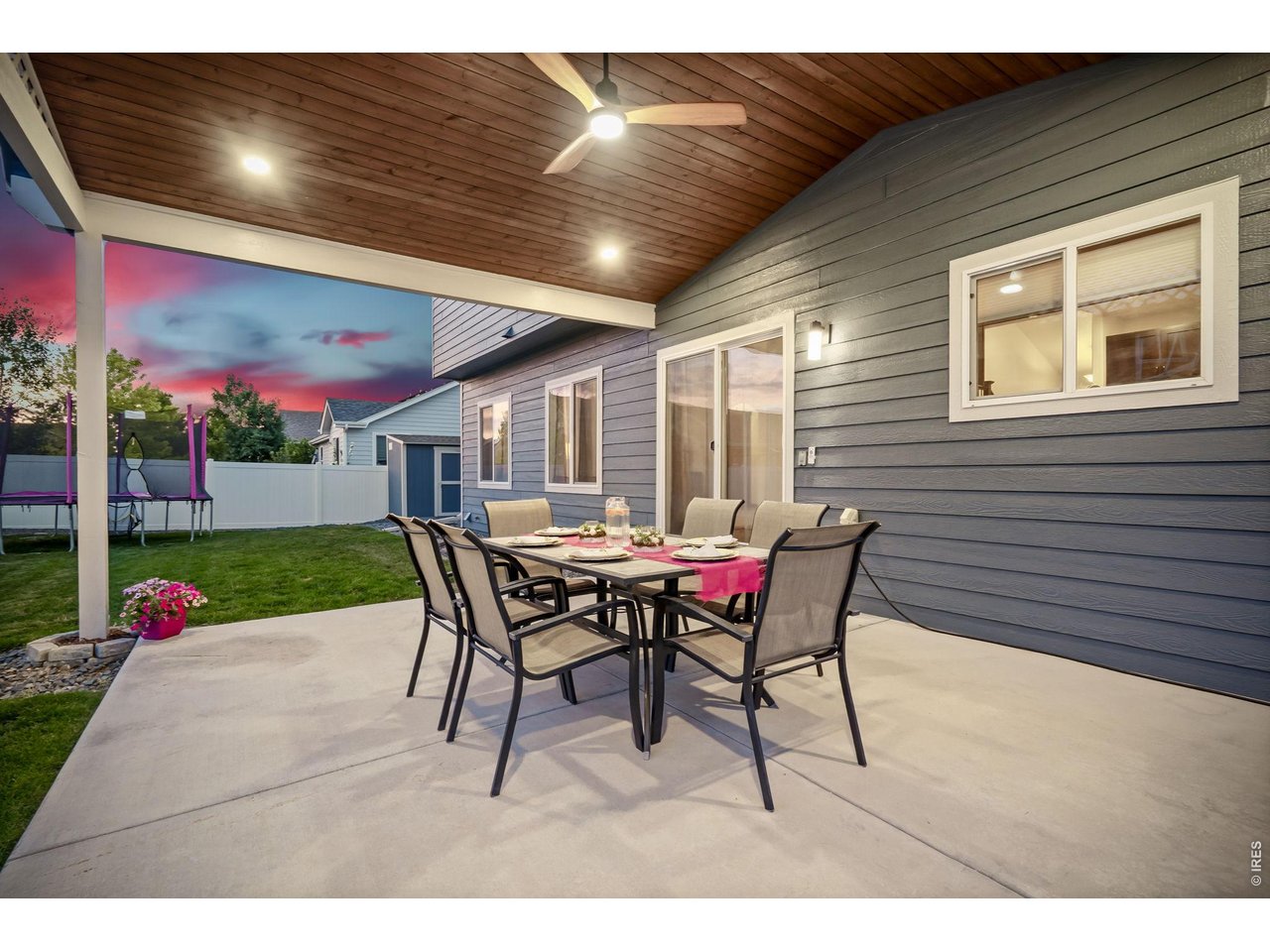 7001 Sumner Street Wellington, CO 80549 - Photo 3 of 40 Recessed canned lighting and ceiling fan on patio.