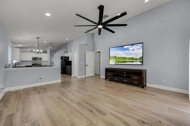 a bedroom with a bed and a table