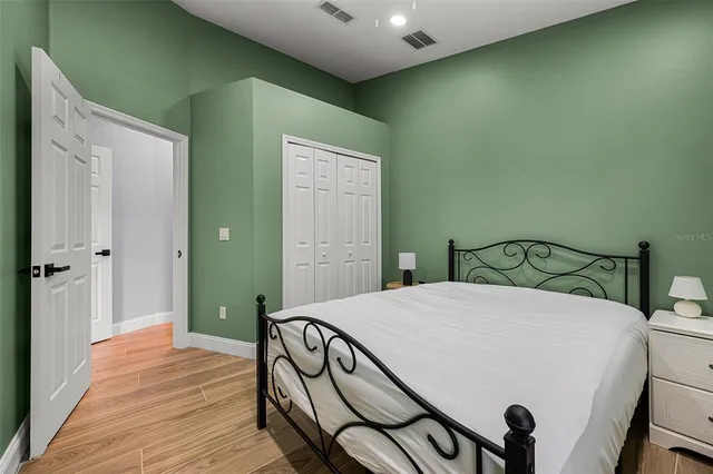 a view of a house with a yard and garage