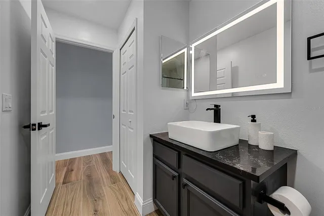 an aerial view of a house with a swimming pool yard and outdoor seating