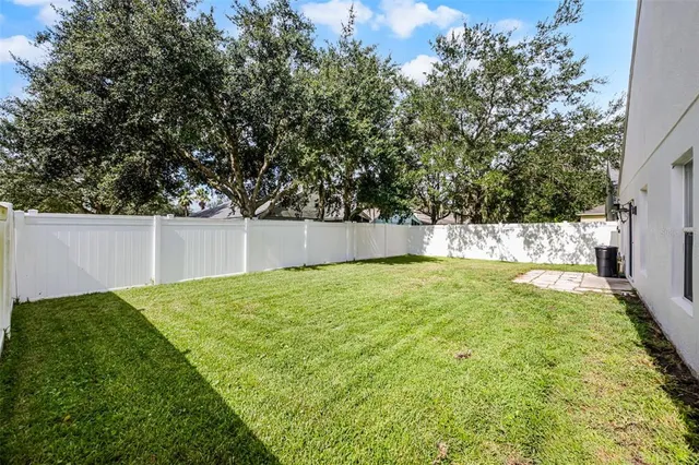 an aerial view of a house with a garden