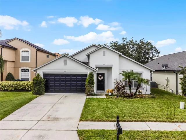 a house view with a garden space