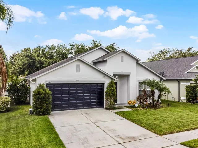 a front view of house with yard