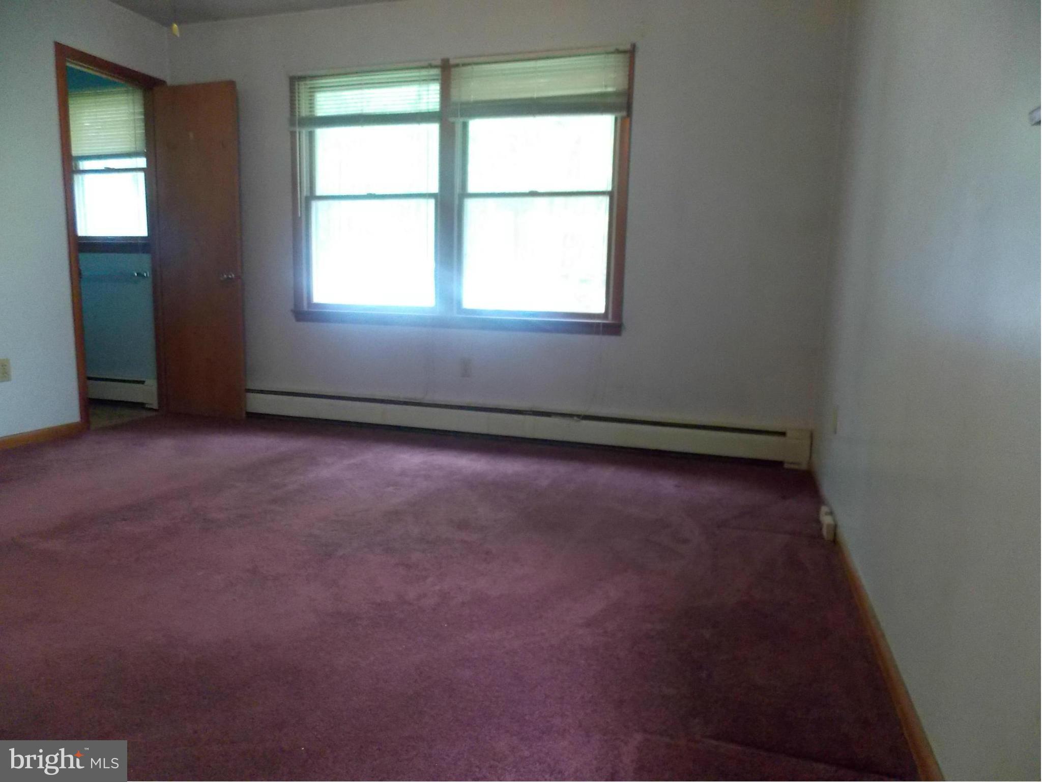3039 Menges Mill Road Taneytown, MD 21787 - Photo 14 of 25 an empty room with a window