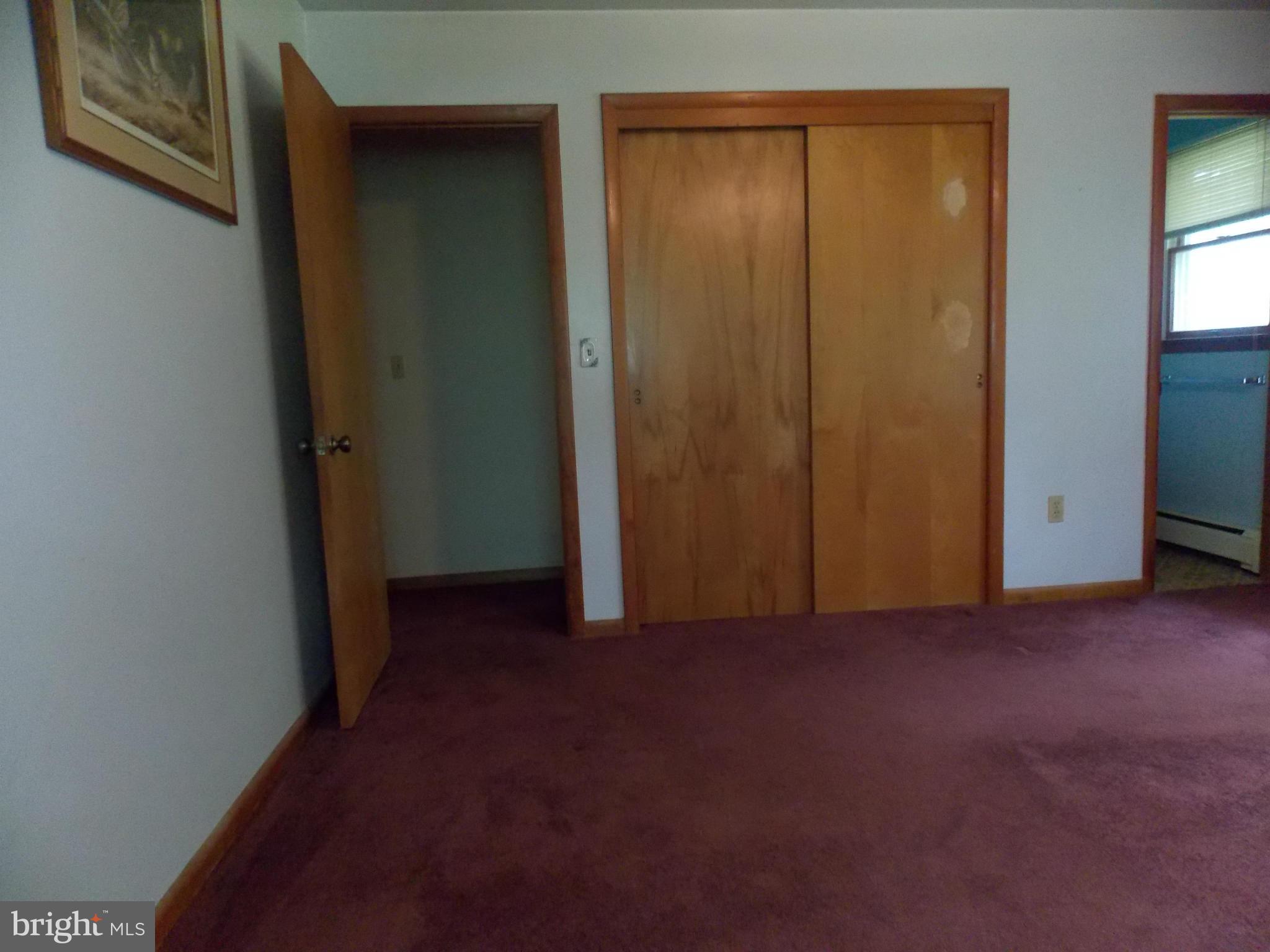 3039 Menges Mill Road Taneytown, MD 21787 - Photo 15 of 25 an empty room with windows