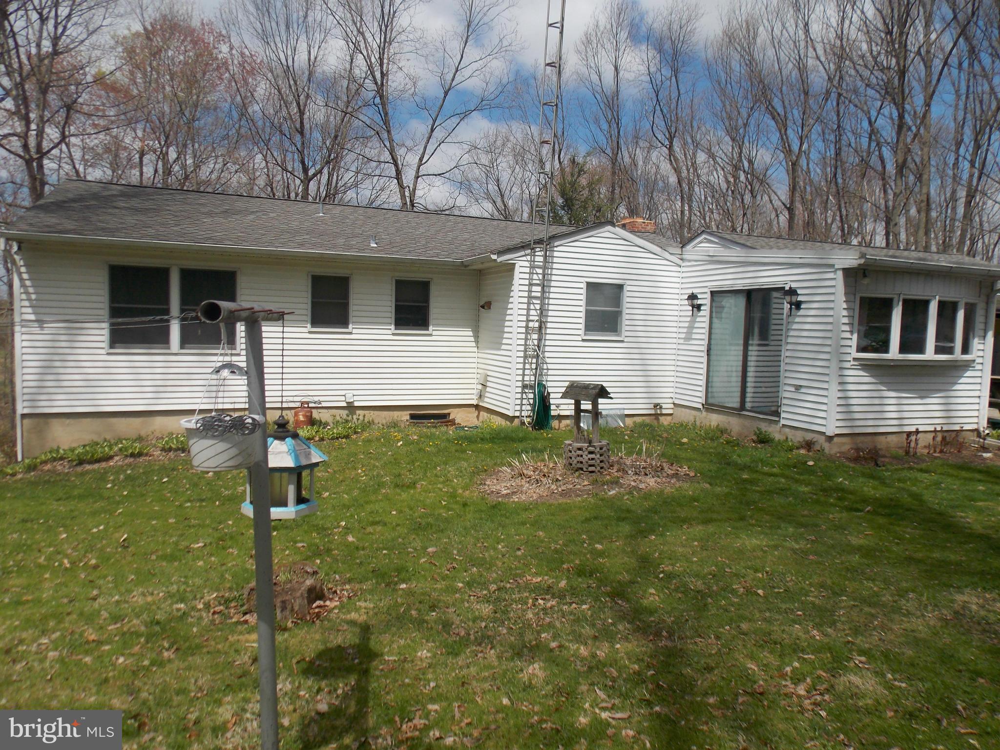 3039 Menges Mill Road Taneytown, MD 21787 - Photo 21 of 25 a view of a house with backyard