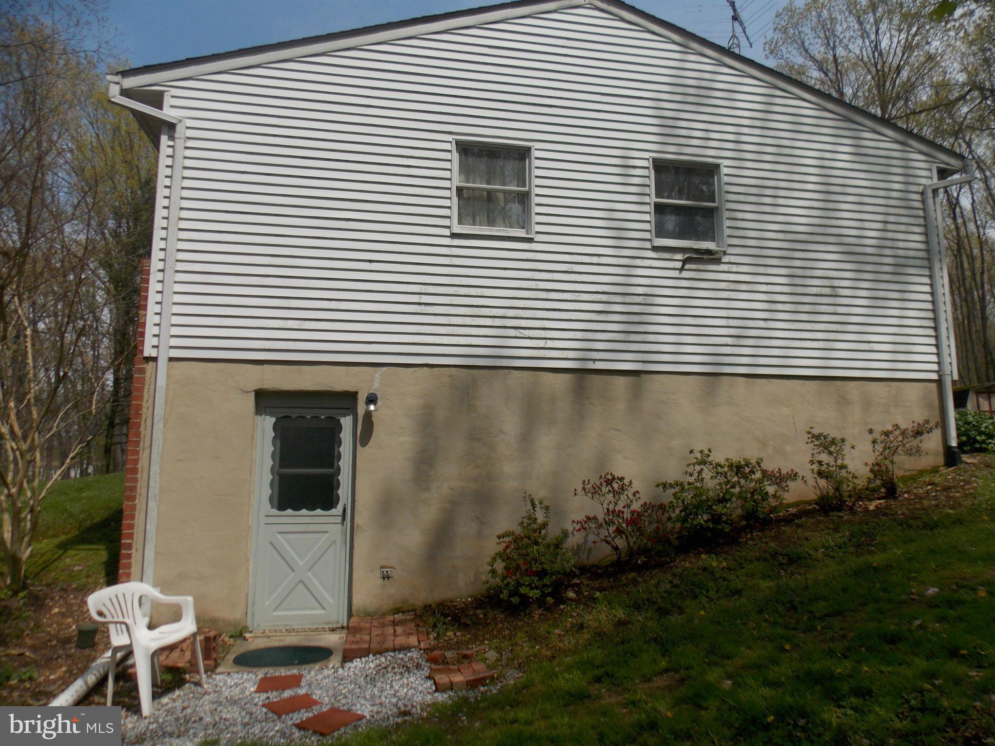 3039 Menges Mill Road Taneytown, MD 21787 - Photo 23 of 25 a view of a house with backyard