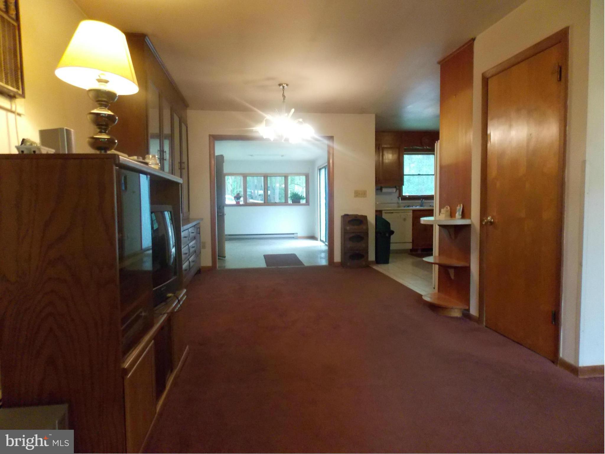 3039 Menges Mill Road Taneytown, MD 21787 - Photo 6 of 25 a room with furniture and a window
